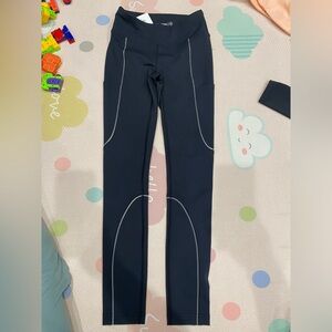 NWT Outdoor Voices black yoga pants,  silver reflectors. 2 side pockets. Size XS